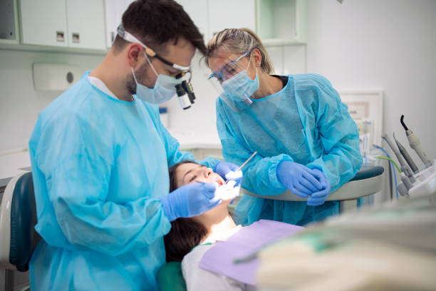 dental professionals working on a patient